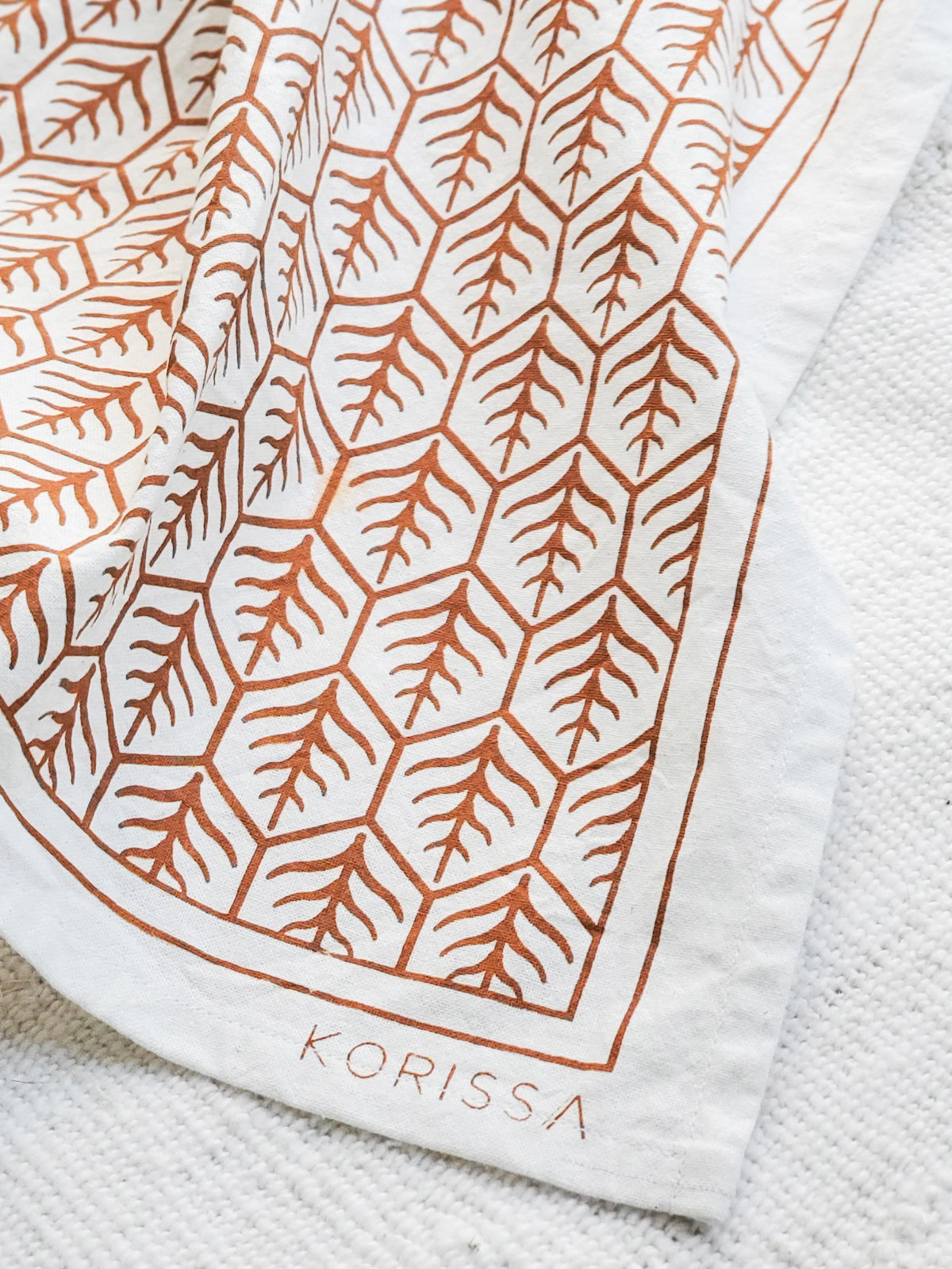 Korissa Hand Screen Printed Tea Towel, close-up of light brown print, natural cotton