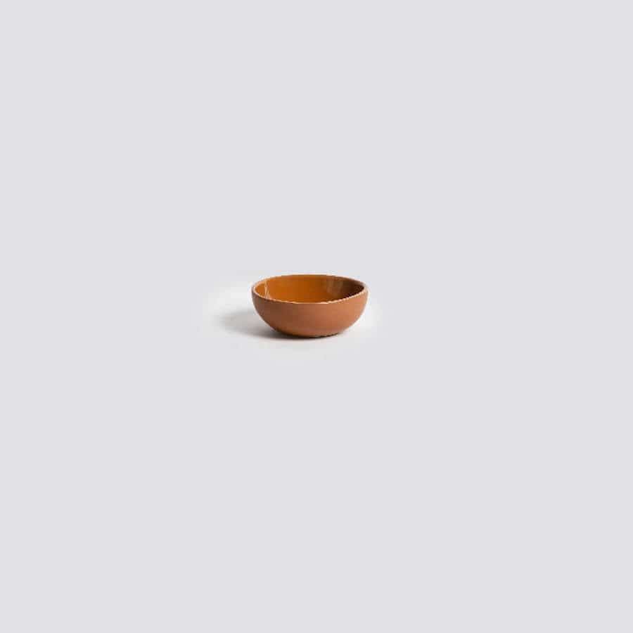 Stoneware bowl in Terracotta on neutral background