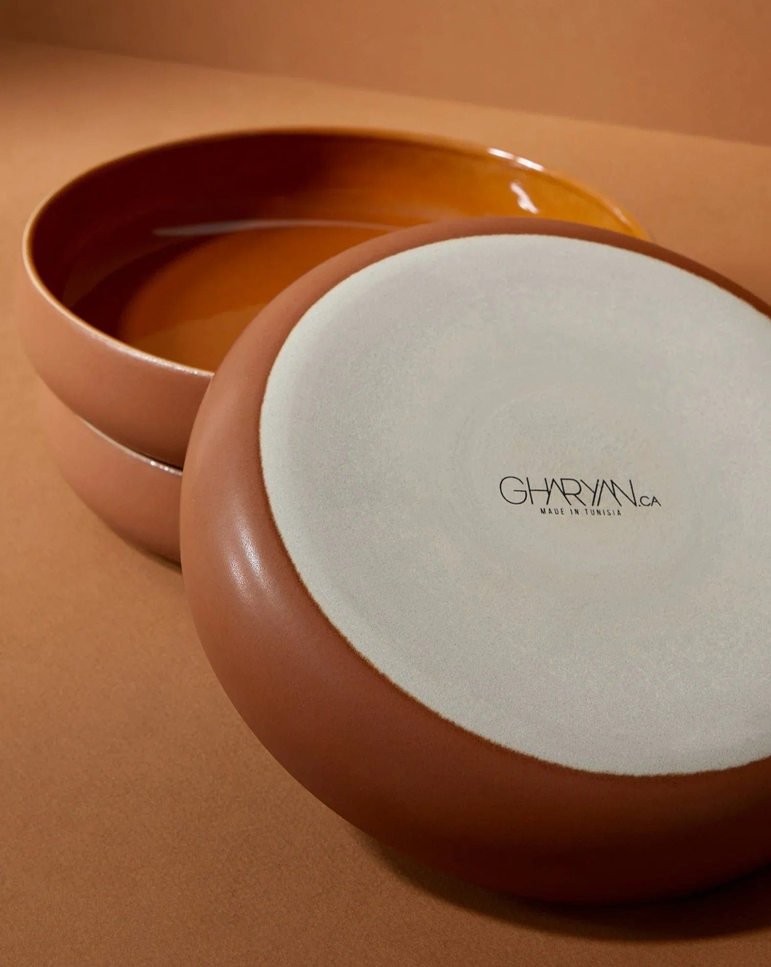 Stoneware bowl in Terracotta side angle showing glazed interior with Gharyan maker's mark