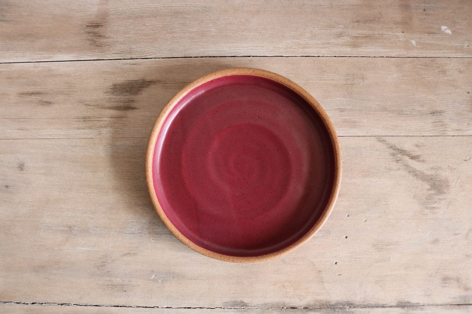 Burgundy handmade small salad plate top view