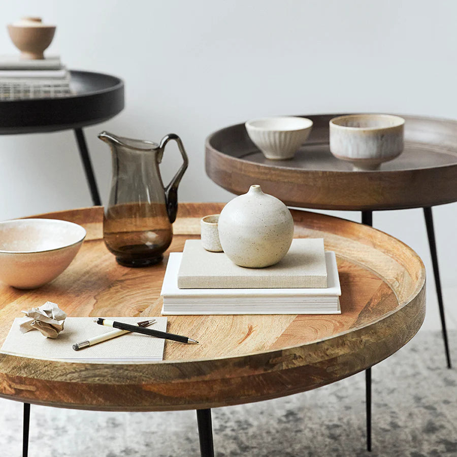 Mater Bowl Table Large styled with ceramics and everyday objects