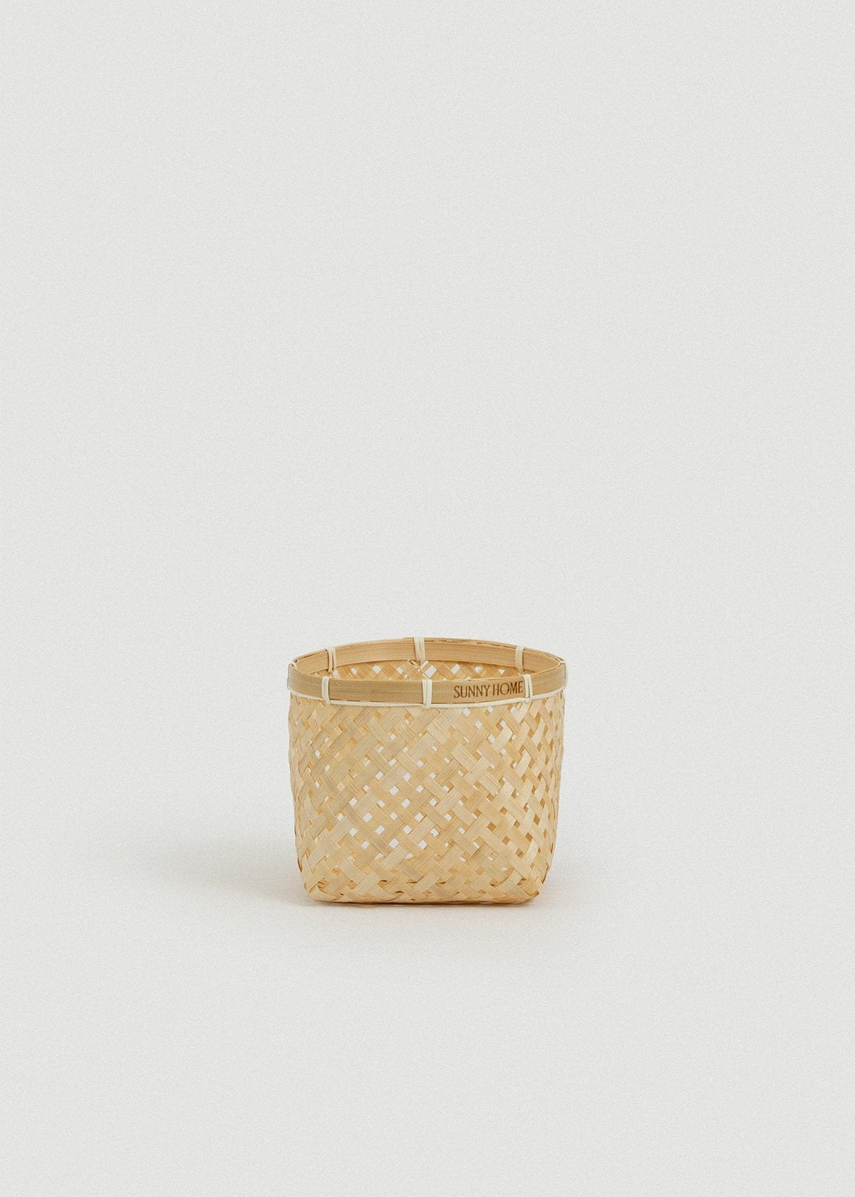 Smallest square Muko basket with an open lattice weave and reinforced bamboo rim.