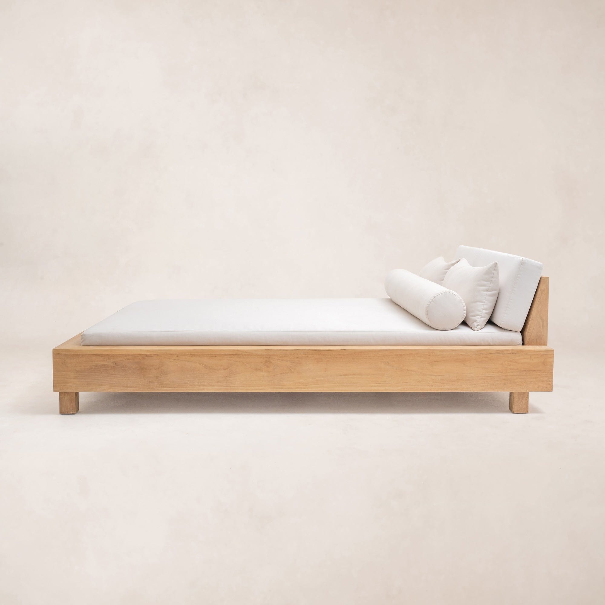 Side profile of Ojai outdoor daybed in teak