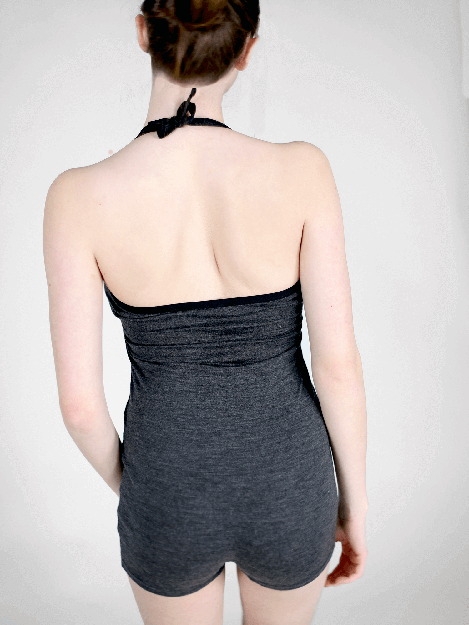 Back view of a merino wool sauna bath suit showcasing a comfortable fit, breathable fabric, and minimalist design.
