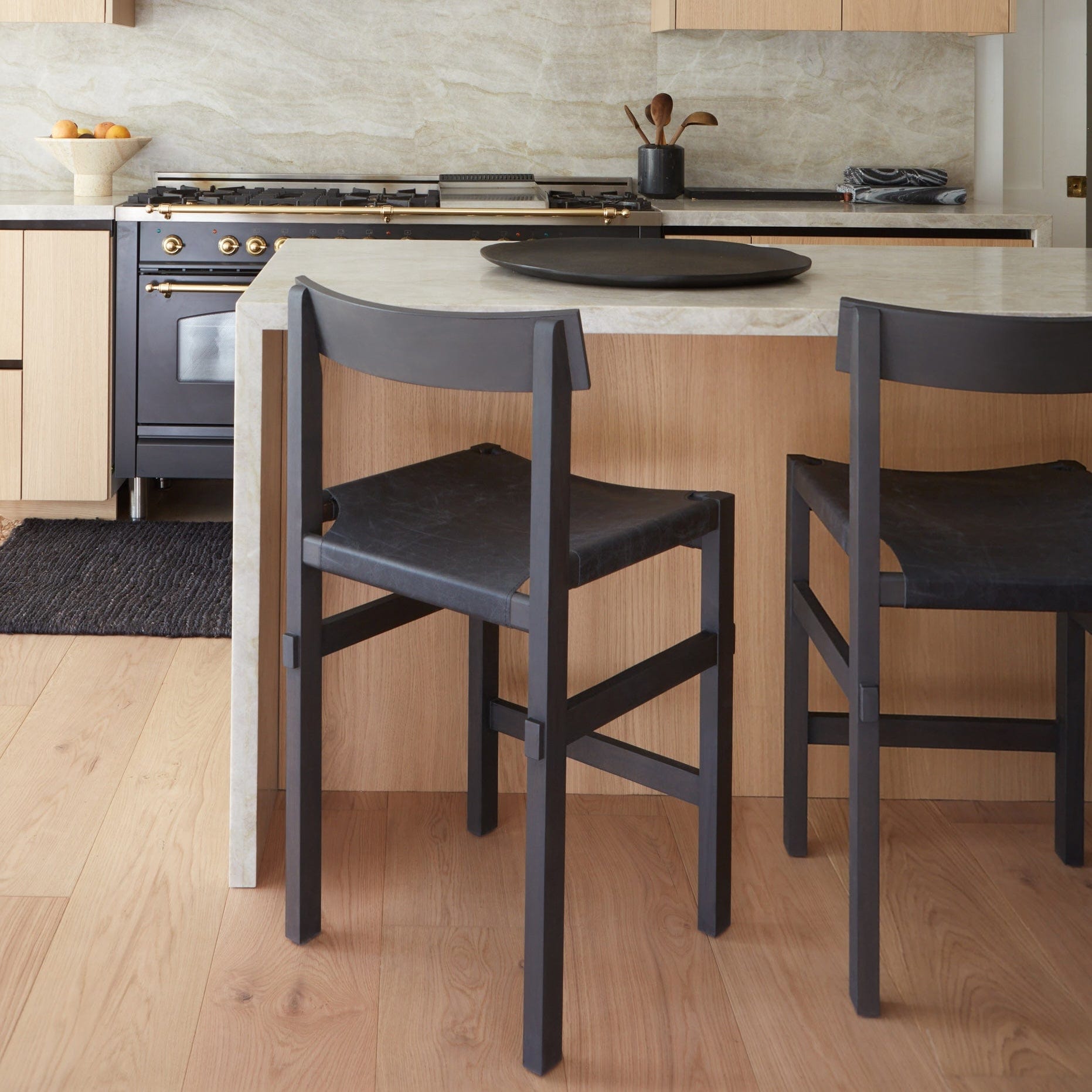 The Shinto Counter Stool was designed as an ode to the traditional Japanese Torii Gate found at the entrances of Shinto shrines.