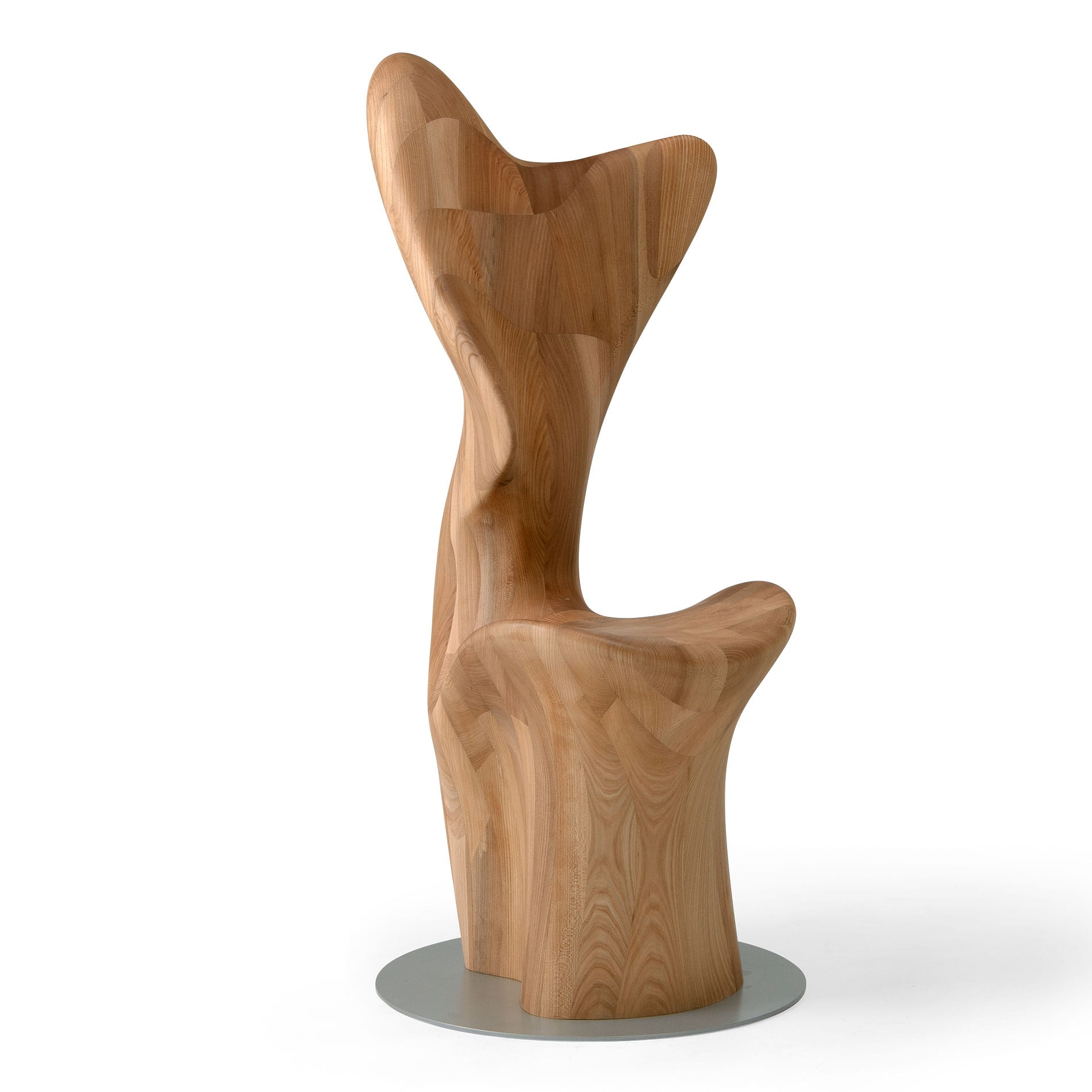Right side profile of HUG Chair by CondeHouse highlighting flowing form