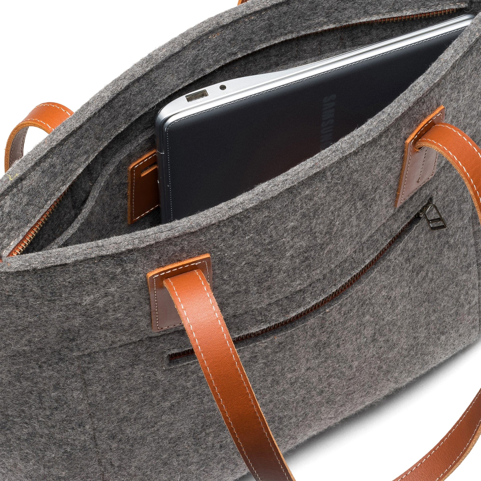 Interior of Kyrgies Handmade Wool Tote showing spacious compartment and organizational pocket