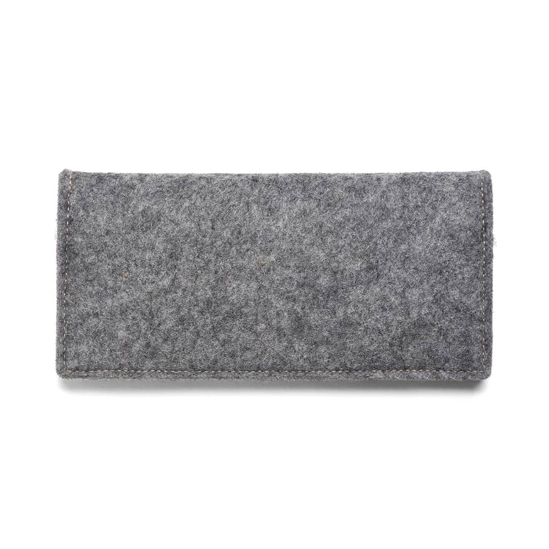 Kyrgies Travel Wallet handcrafted from natural wool felt with vegetable-tanned leather detailing