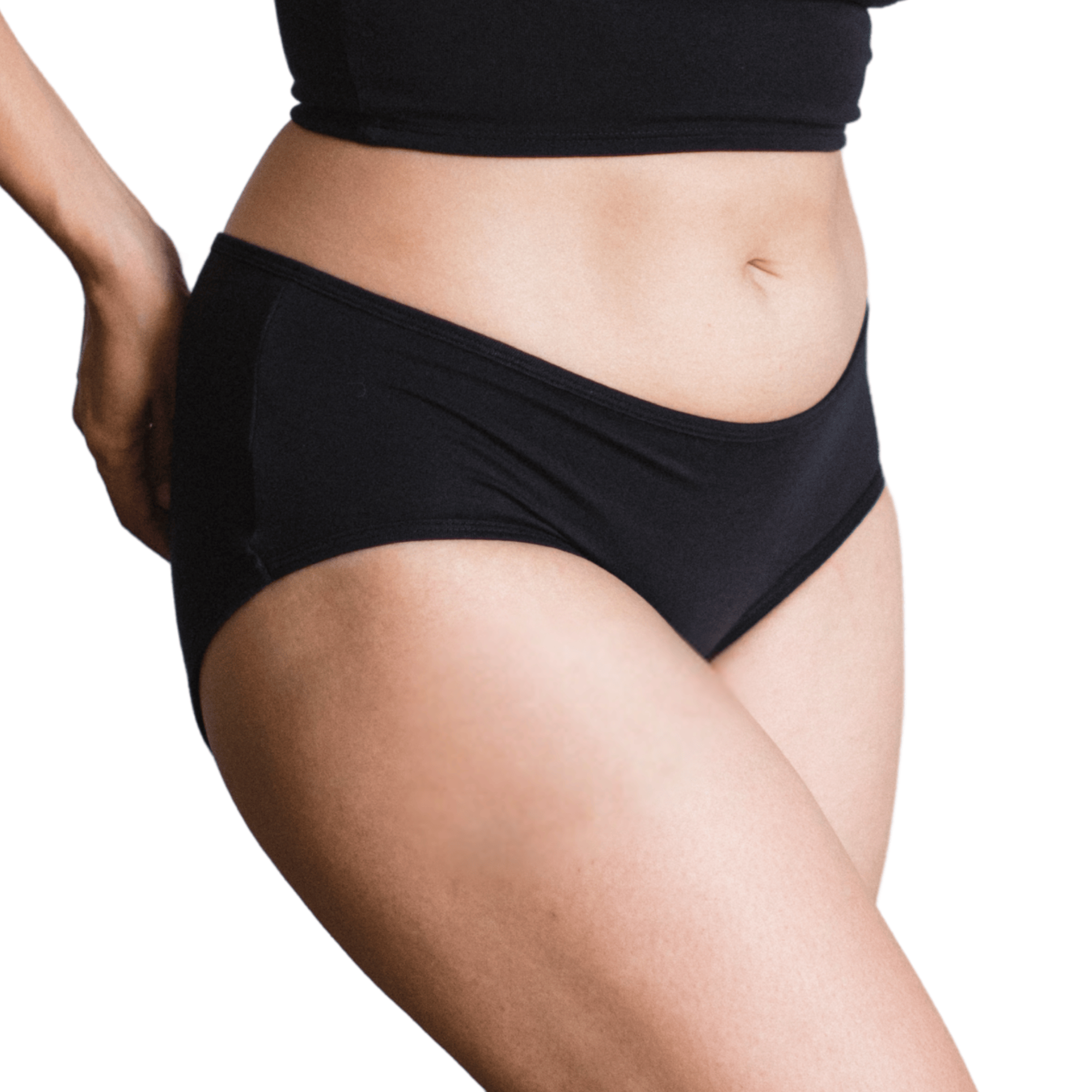 Model wearing Organic Cotton Mid-Rise Brief in Black, side view