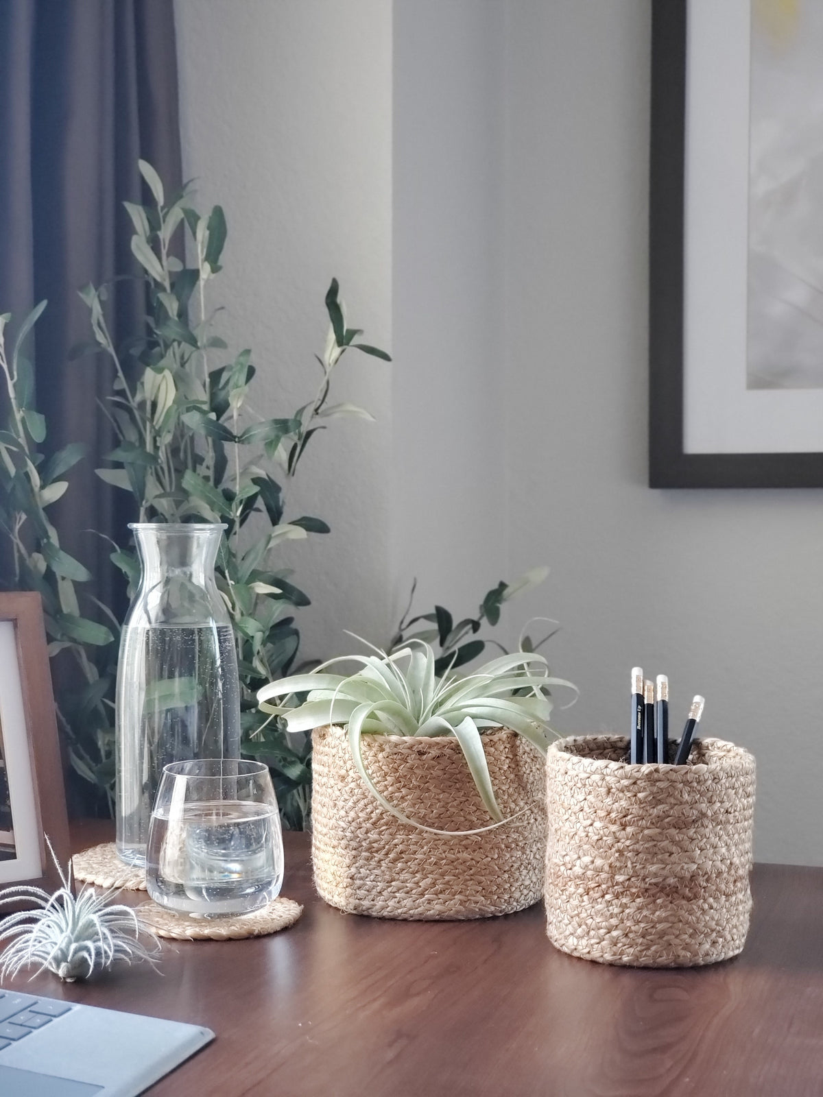 Korissa Kata Bin on wood table with glass carafe