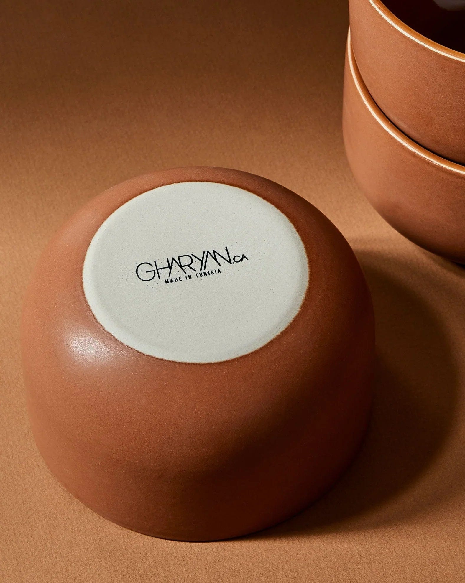 Stoneware bowl in Terracotta base view showing Gharyan maker's mark