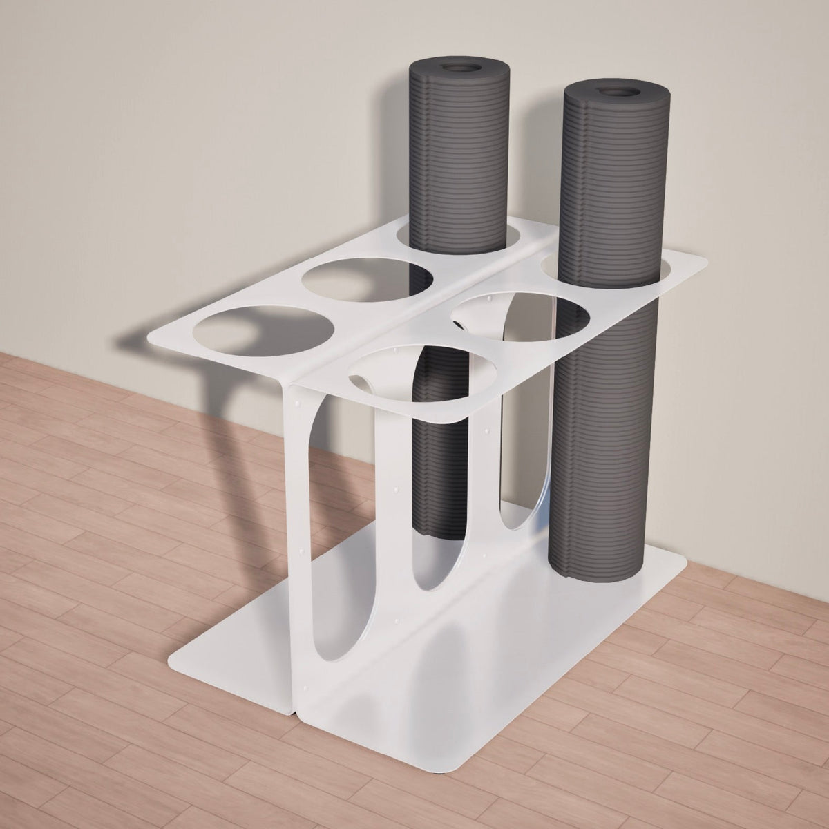 White six-slot floor stand holding three rolled gray yoga mats or foam rollers, viewed from above at an angle.