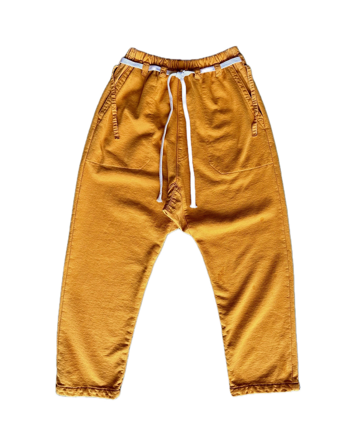 Front product view of golden mustard Picasso pants with a white drawstring and contrasting waistband detail.