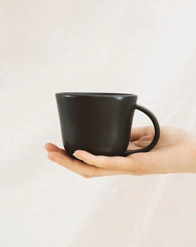 Gharyan Stoneware Japandi Tableware Mug, Matte Black, held for scale