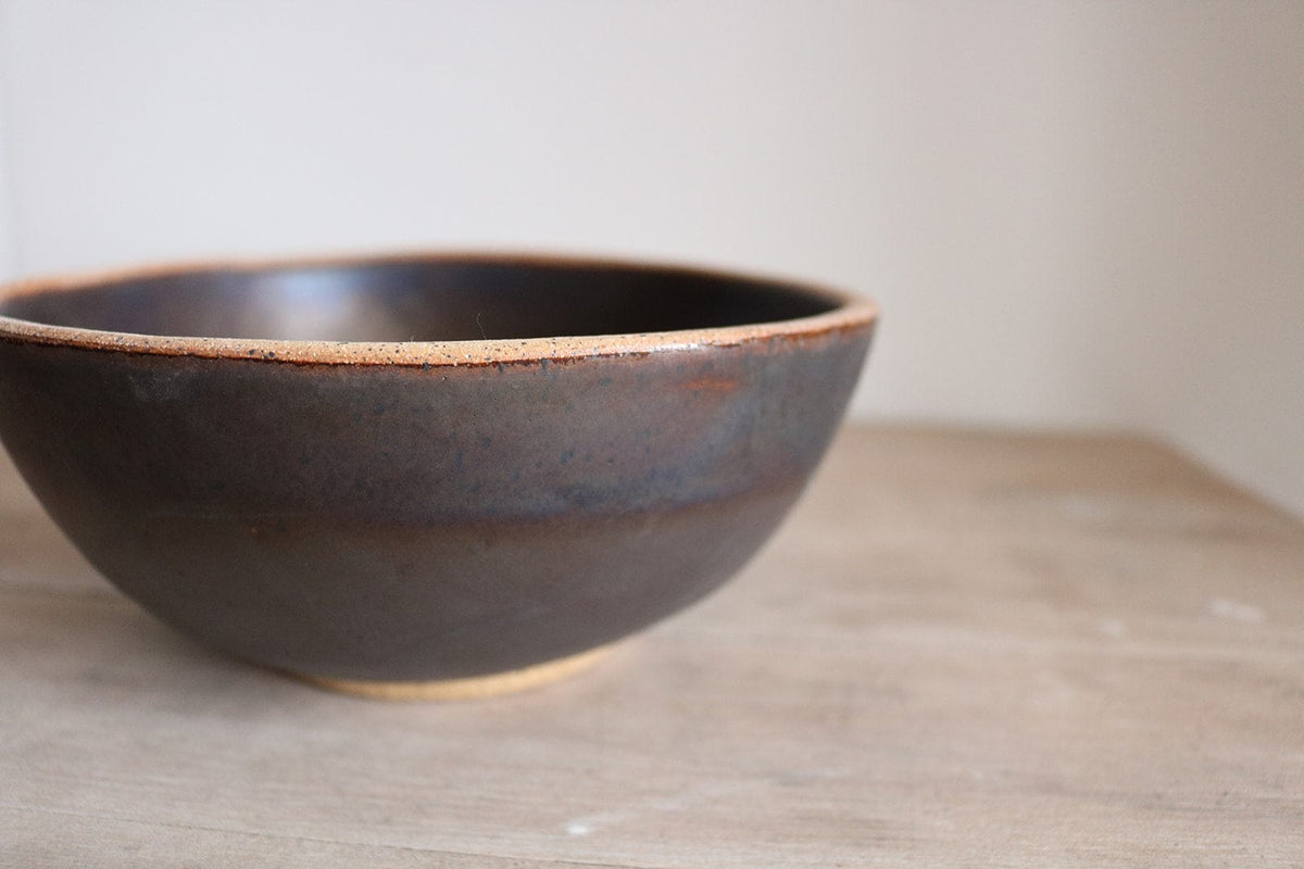 Brown handmade ceramic cereal bowl with warm earth glaze