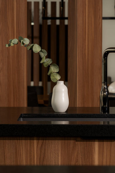 Stoneware vase in Matte White with eucalyptus on kitchen counter