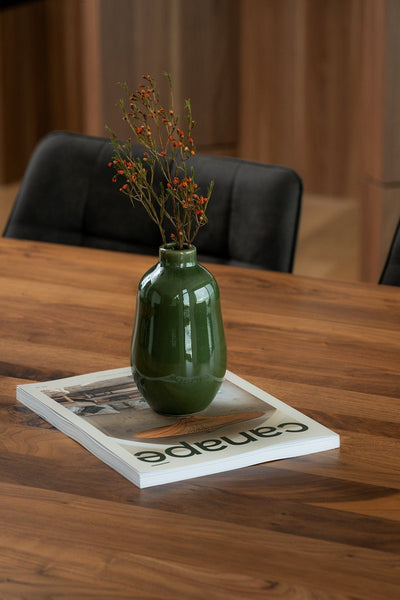 Stoneware vase in Matte Green with dried branches on wood dining table