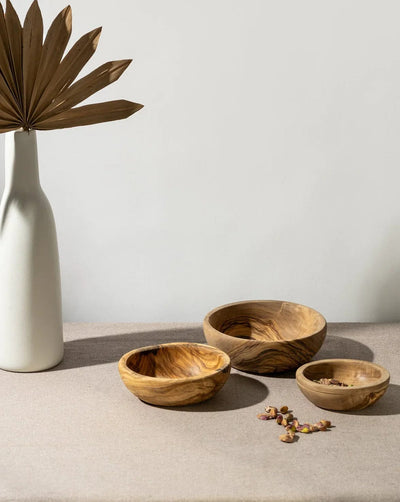 Olive wood nesting bowls set of 3 styled with dried palm leaf and ceramic vase