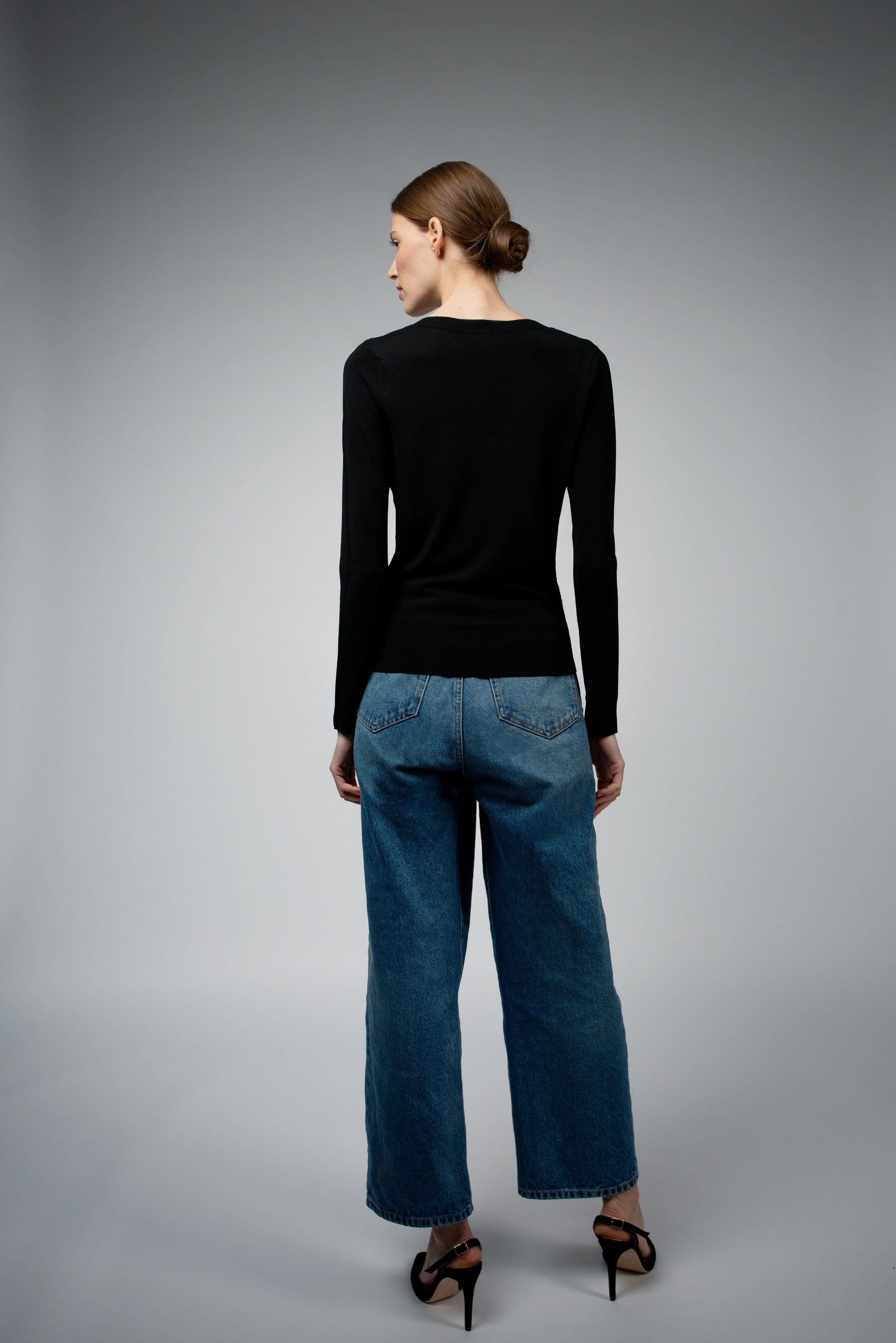 Livia Long-Sleeve V-Neck Sweater in black, full-length styled back view — Santicler Japandi fashion