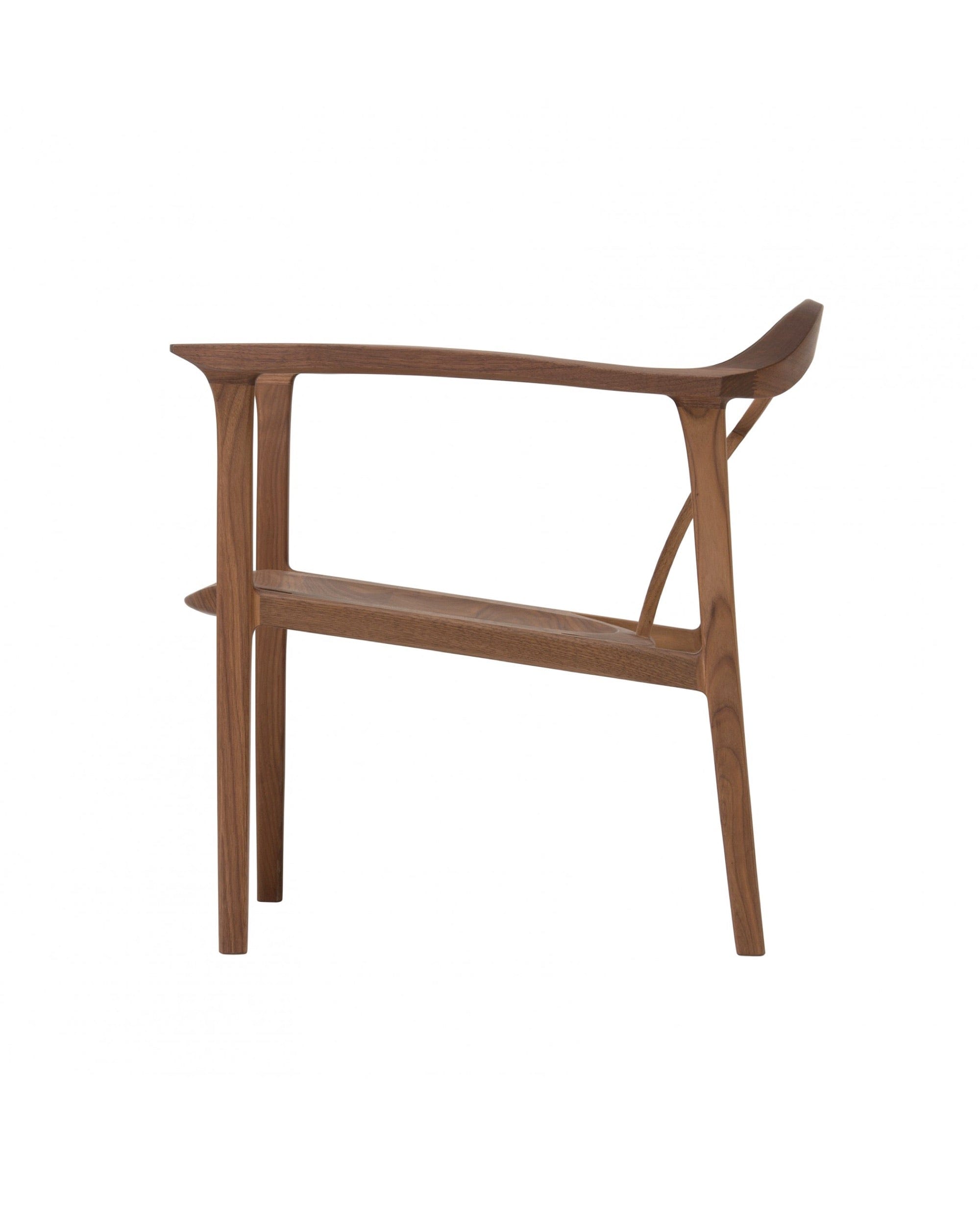 NAGARE Armchair seat and leg detail with light and shadow contrast