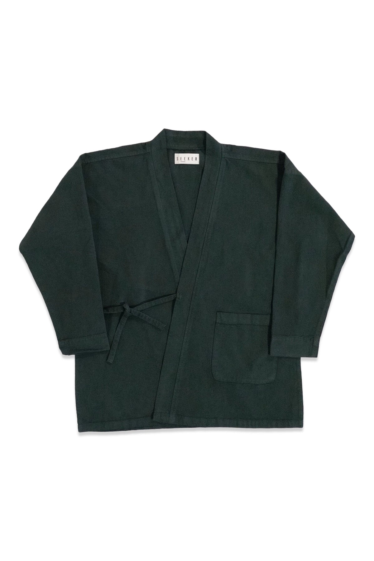 Front product view of the dark forest-green GI wrap jacket with waist ties and patch pockets.