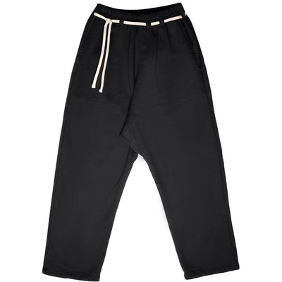 Front product view of black Picasso pants with a white drawstring and relaxed drop-crotch fit.