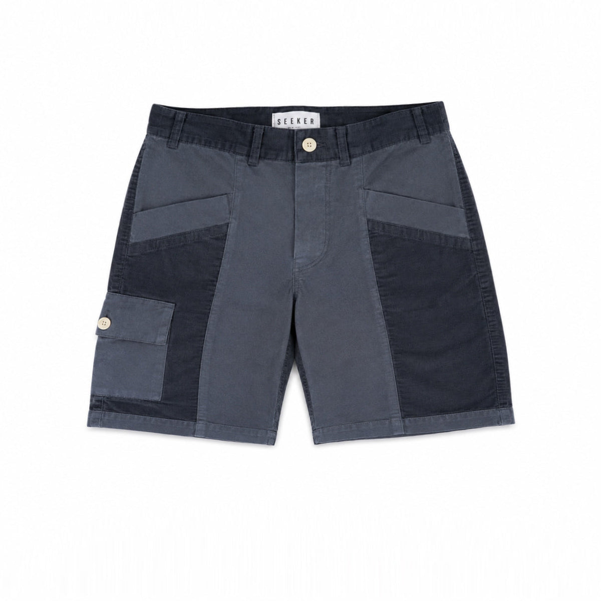 Front product view of slate-blue Trek Shorts with dark tonal panels and a buttoned cargo pocket.