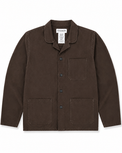 Front product view of the dark brown Travelers Jacket with three patch pockets.