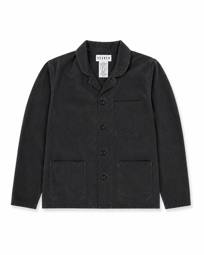 Front product view of the black Travelers Jacket with three patch pockets.
