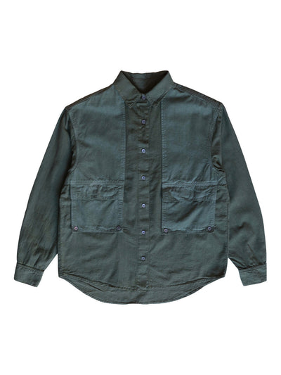 Front product view of the muted teal-green Trek Shirt with four utility pockets.