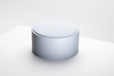 Two pale blue-gray Mogo Bowls nested together, showing their compact stackable cylindrical design.