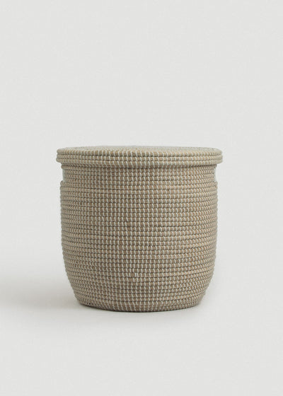 Front view of the lidded Medina basket showing its rounded cylindrical shape and tightly woven texture.