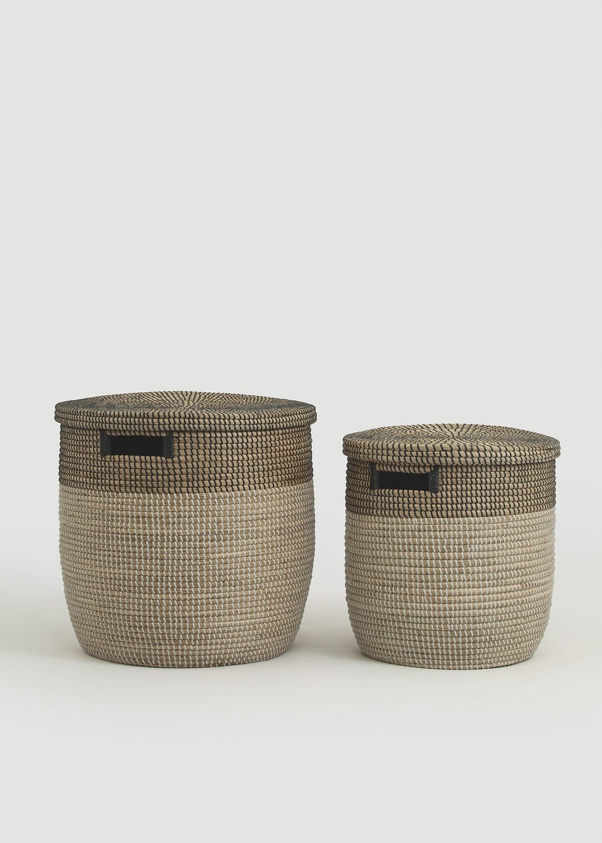 Large and small Black Medina baskets displayed together for size comparison.