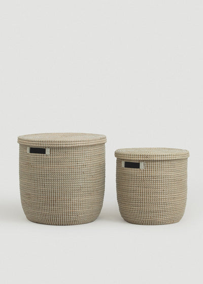 Large and small Medina seagrass baskets displayed together for size comparison.