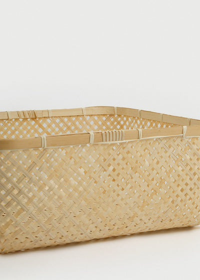 Close-up of the open diamond weave, reinforced upper rim, and natural bamboo texture.
