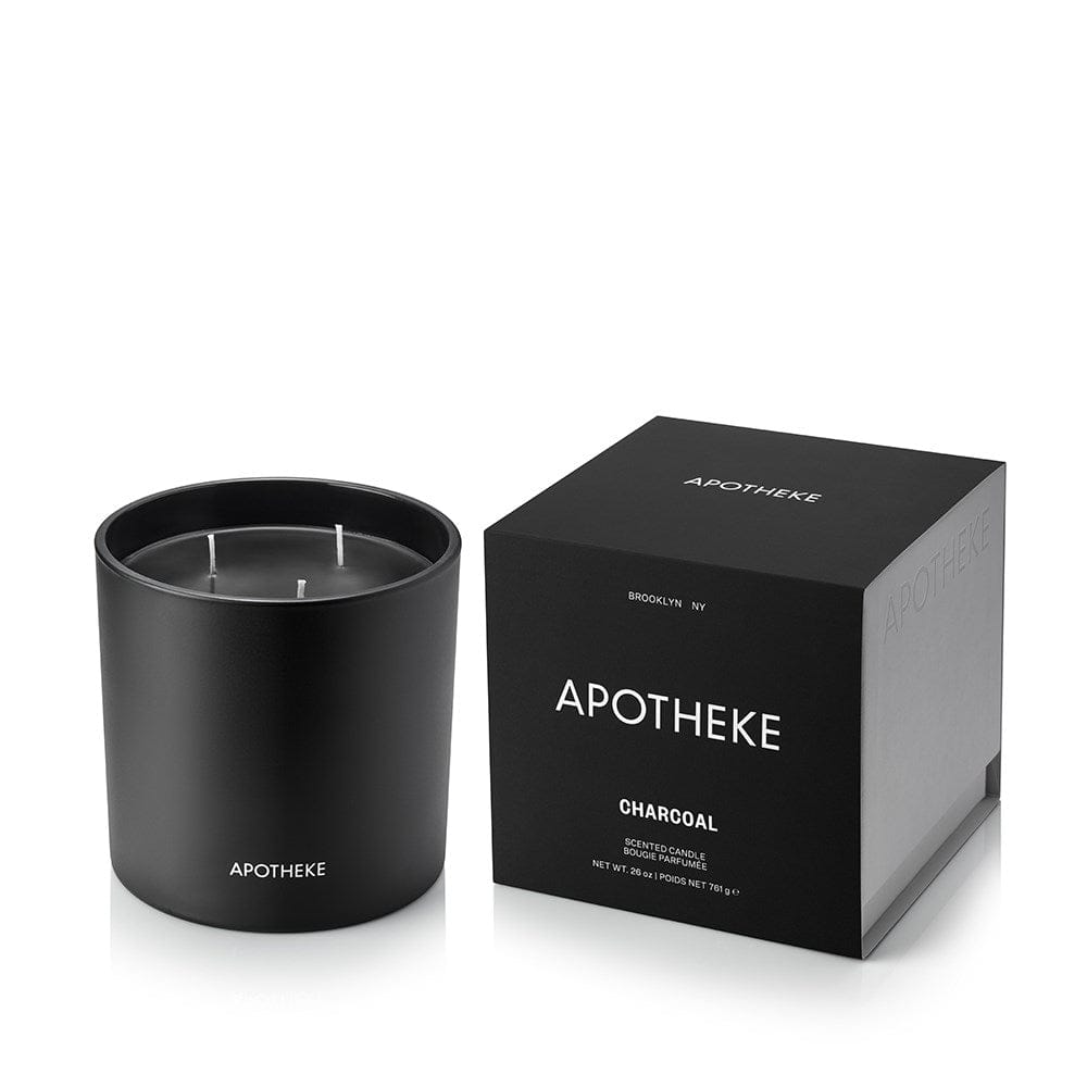 Charcoal 3-Wick Candle in matte black glass beside APOTHEKE packaging box