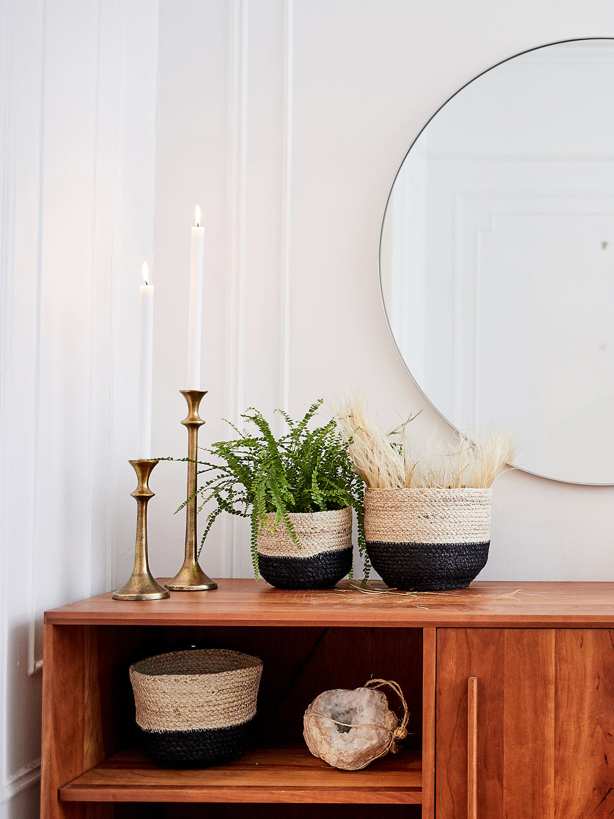 Korissa Naiya Bin styled on console table with candles and plant