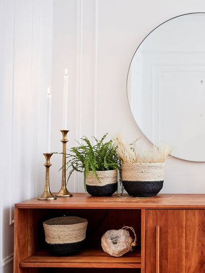Korissa Naiya Bin styled on console table with candles and plant