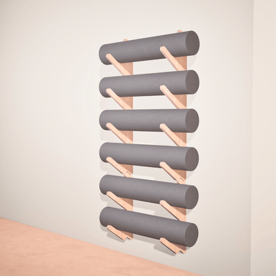 Stack Rack yoga prop organizer with foam rollers stored vertically