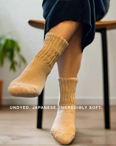 Undyed Organic Cotton Japanese Crew Socks in cream on feet  in room available at Japandi Supply House