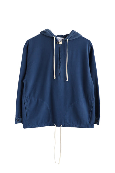 Front product view of the medium-blue Anorak with white hood and hem drawcords.