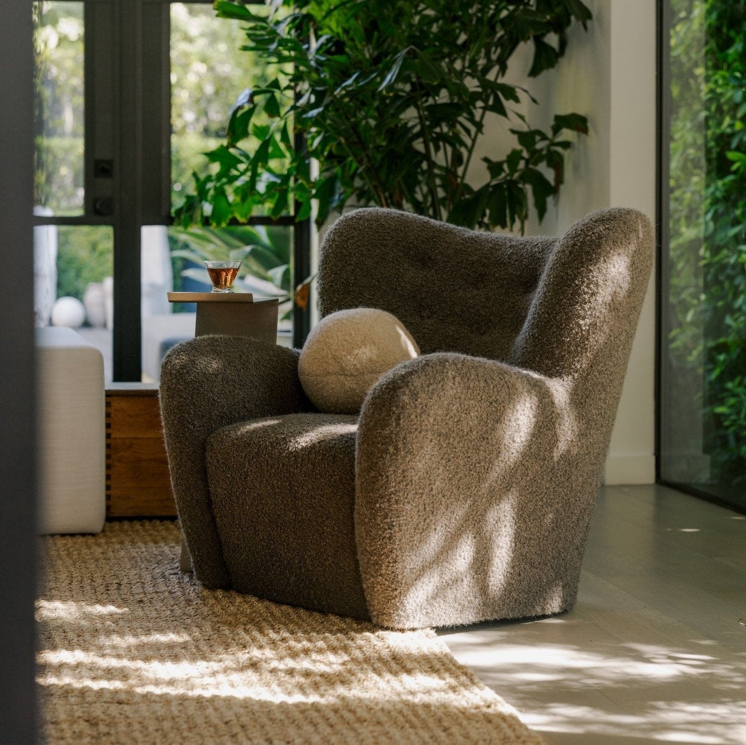 Papa Teddy Lounge Chair styled in living space with natural light