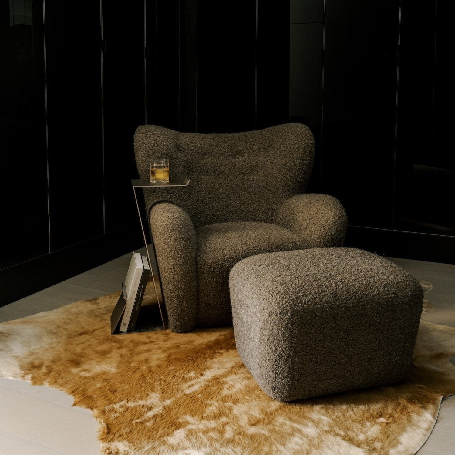 Papa Teddy Lounge Chair styled in interior setting with ottoman
