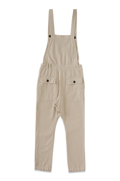 Back product view of cream overalls with side buttons and rear pockets.