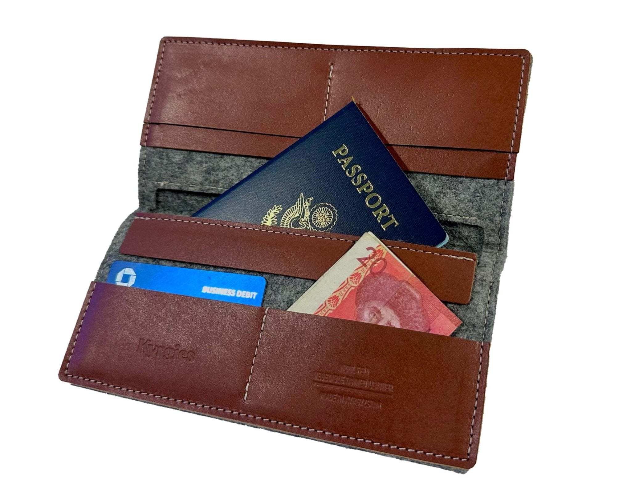 Kyrgies wool felt travel wallet holding passport, cards, and travel essentials