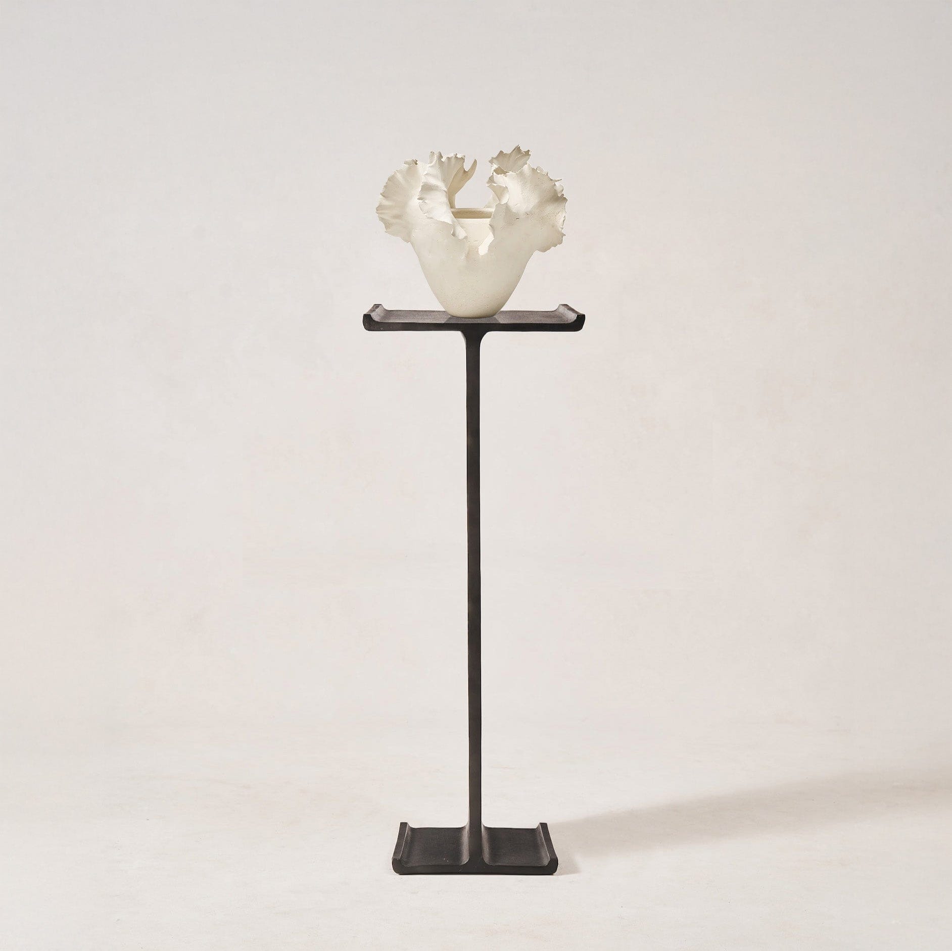 I-Beam Sculptural Pedestal by House of Leon with sculptural ceramic vessel