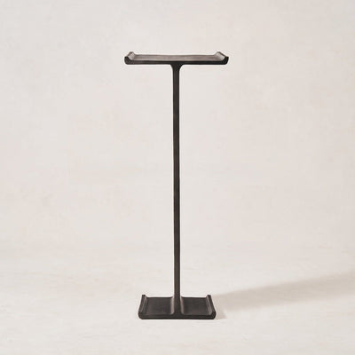 Tall aluminum pedestal stand with architectural silhouette