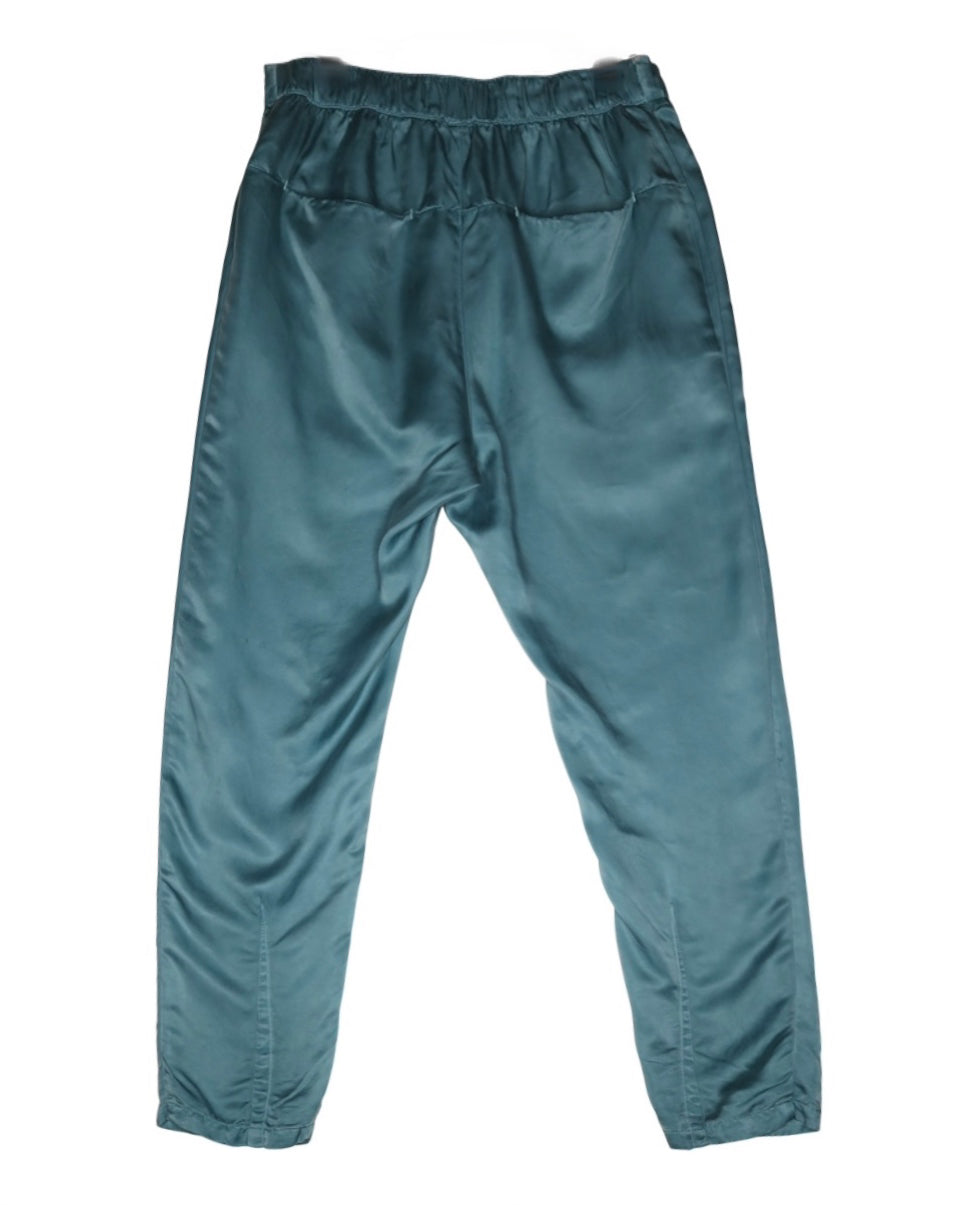 Back product view of teal Souk cupro silk pants with an elastic waistband.