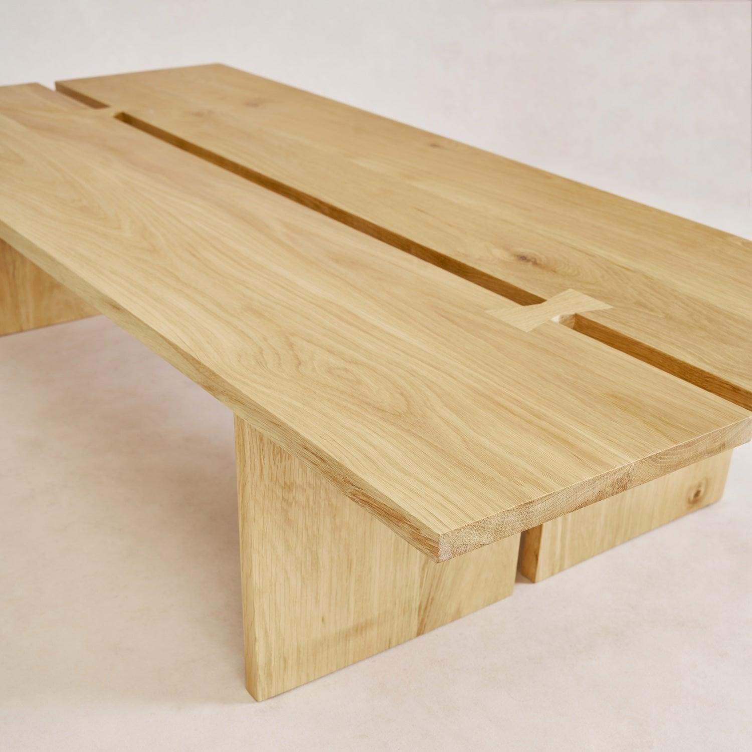 Kyoto coffee table low-profile minimalist silhouette, closeup