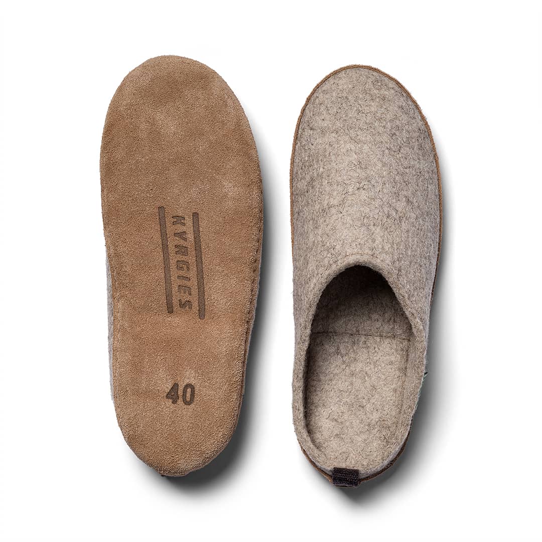 Kyrgies Indoor Wool Slides, oatmeal, top-down view of leather sole beside felt upper
